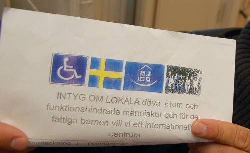 Brev med symboler och text om stöd för döva på dålig svenska